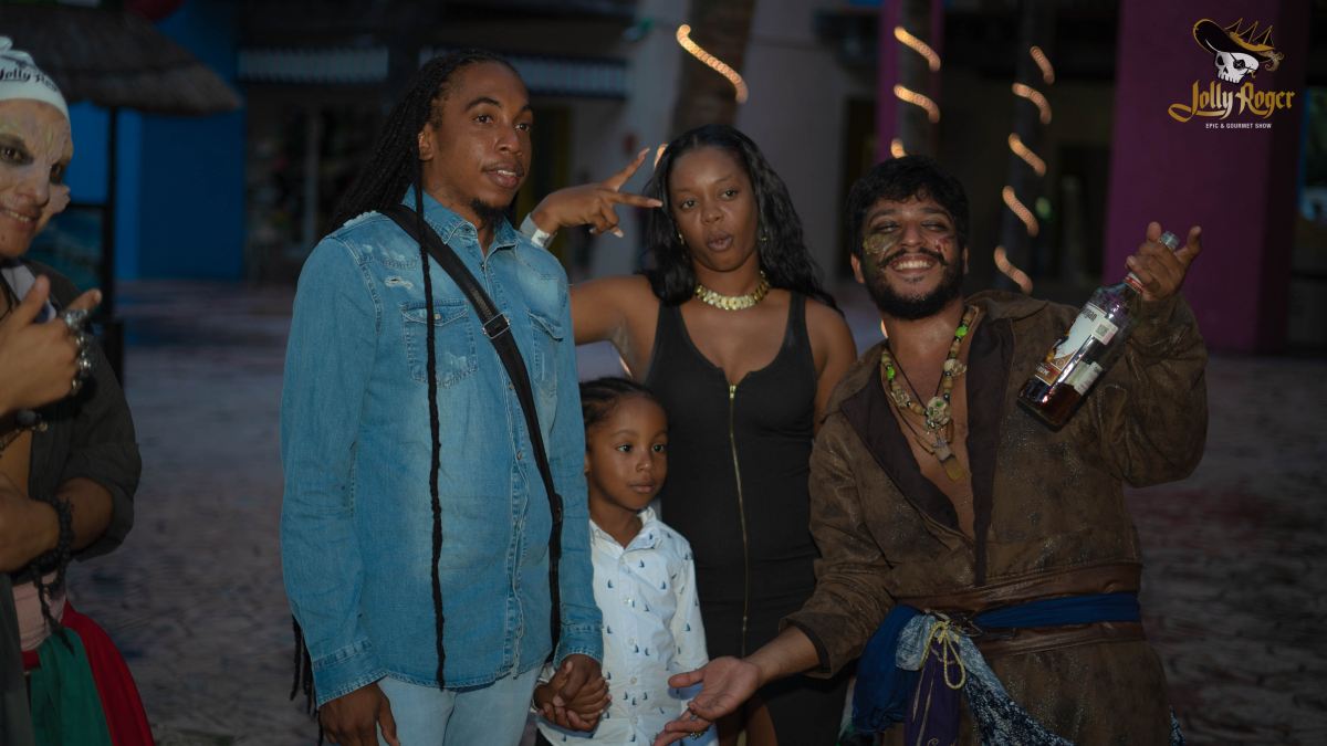 Family posing for a picture at Jolly Roger Pirate Ship